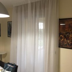 Tenda arricciata classica con curve